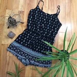 Black and white paisley-like patterned romper